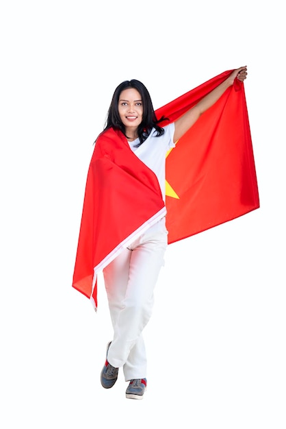 Asian women celebrate Vietnam independence day on 02 September by holding the Vietnam flag