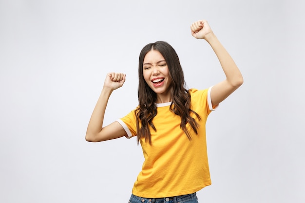 Asian women happiness hand up with winning or success something