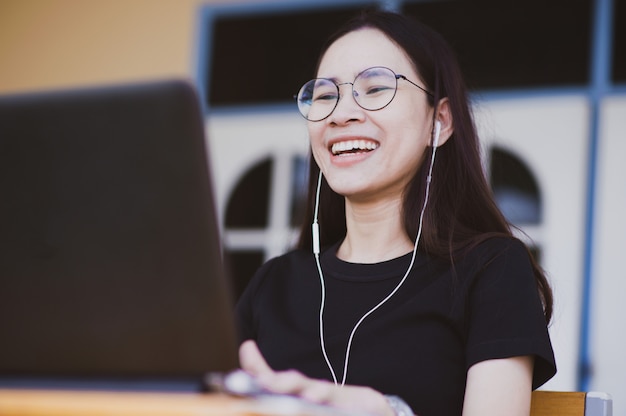 Asian women video conference by Computer notebook, New normal Video call social distancing