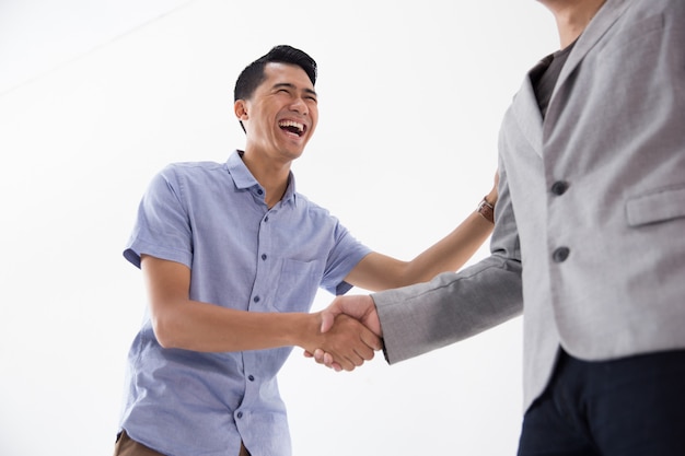 Asian Young Business shake hand