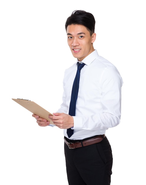 Asian young businessman hold with file board