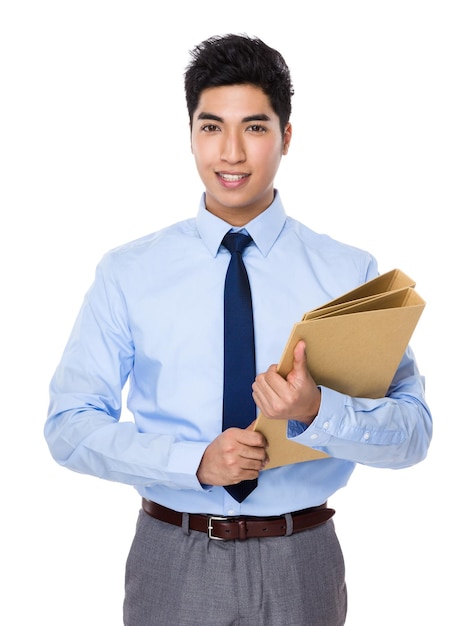 Asian young businessman hold with folder