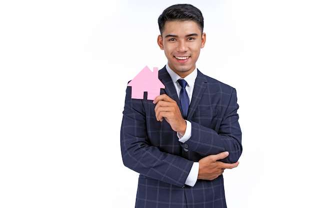 Asian young handsome and cheerful business man hold icon