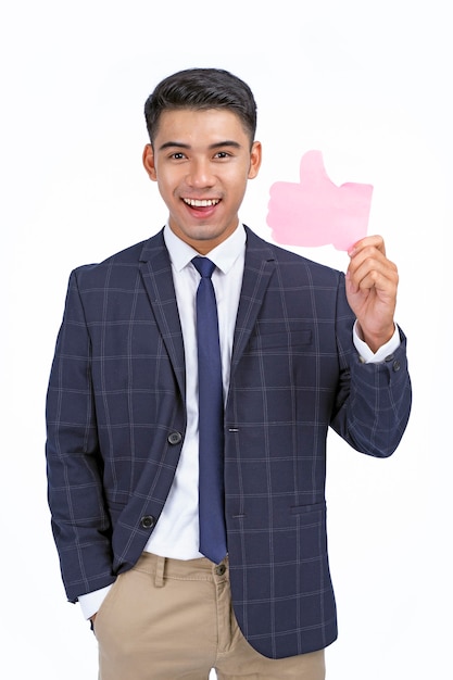 Asian young handsome and cheerful business man hold icon