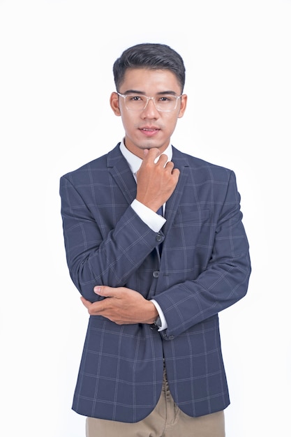 Asian young handsome cheerful business man isolated in white background