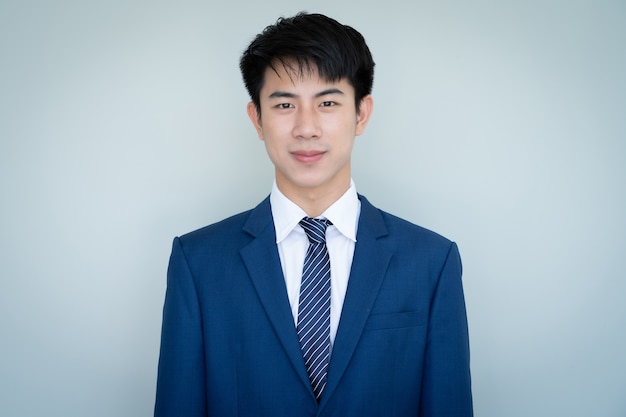 Asian young handsome man in blue suit