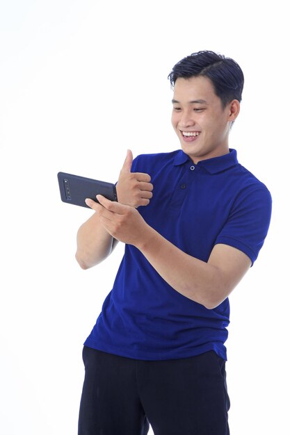 Asian young handsome man in polo shirt isolated on white background