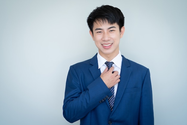 Asian young handsome man wearing suit