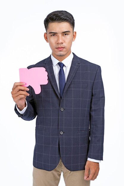 Asian young handsome and sad business man hold dislike icon