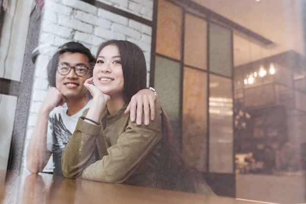 Asian young loving couple at the cafe