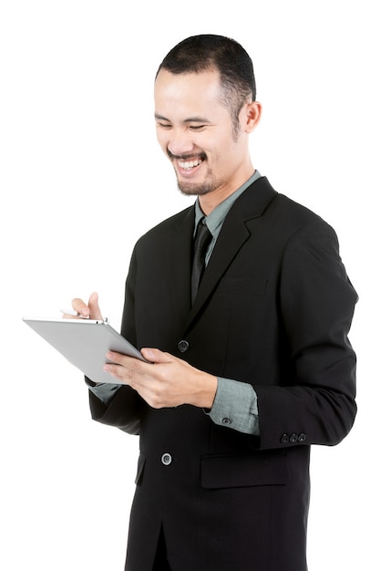 Asian Young Man Using Digital Tablet Isolated On White .