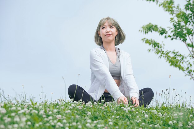 Asian young woman exercising outdoors