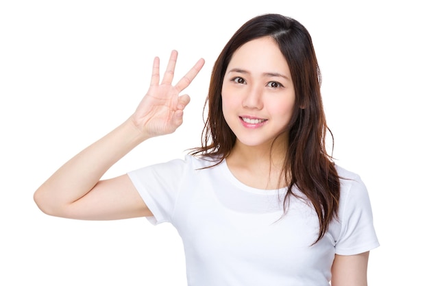 Photo asian young woman showing ok sign gesture