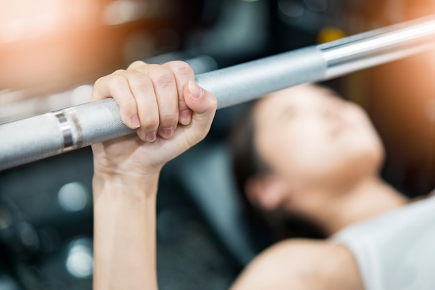 Asian young woman training in the gym