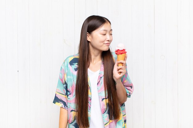 Asian young woman with an ice cream. summer concept