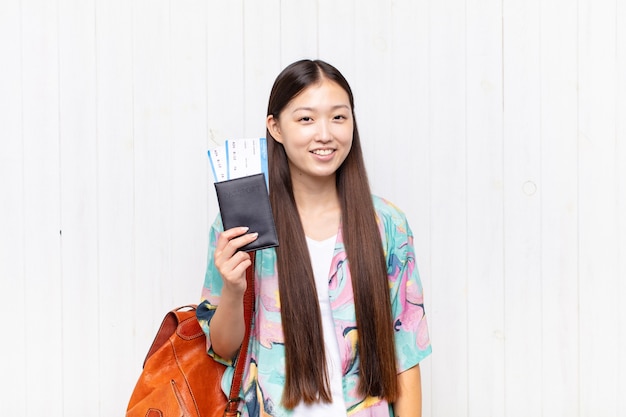 Asian young woman with a passport.