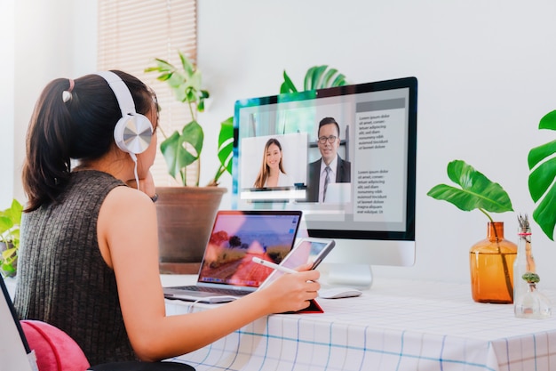 Asian young woman working from home