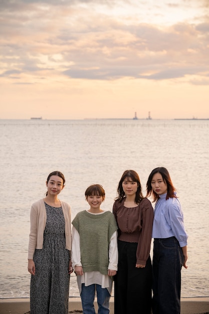 Asian young women gathering to take a commemorative photo