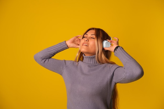 Asianlooking woman in headphones