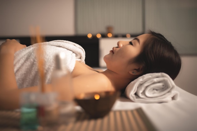 Asians beautiful woman sleep spa and relax massageTime of relax after tired from hard workThailand people