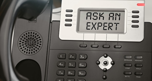 ASK AN EXPERT - concept of text on the IP phone display. Closeup IP Phone