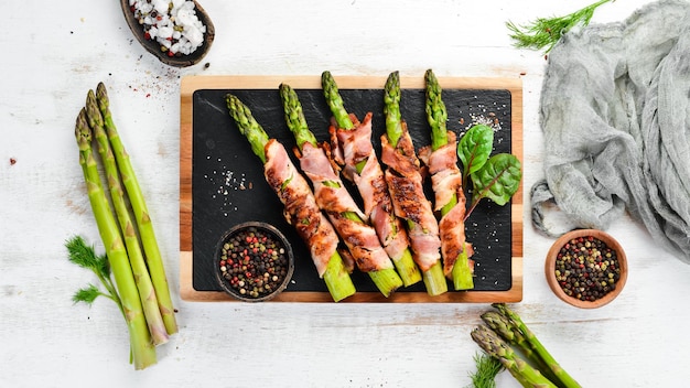 Asparagus baked with bacon and spices Healthy food Top view Free space for your text