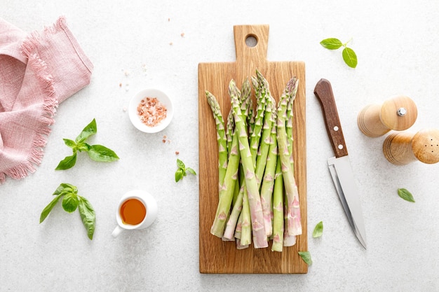 Asparagus Cooking bunch of asparagus on kitchen table Top view