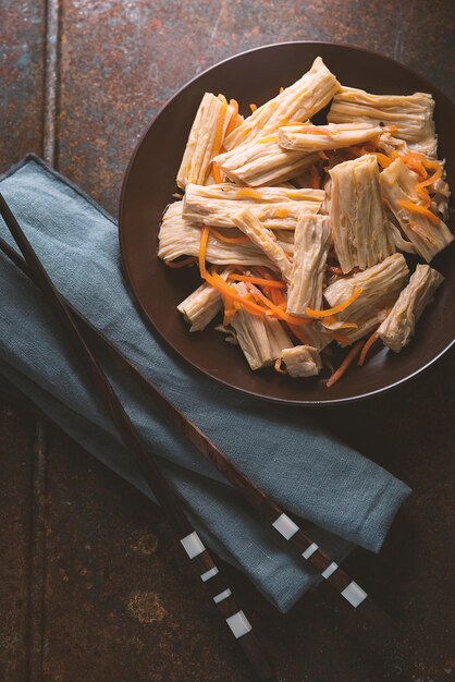 Asparagus in Korean and carrots in a bowl