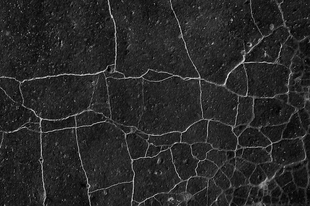 Фото Асфальт в трещинах текстуры / абстрактный фон трещины на асфальтовой дороге