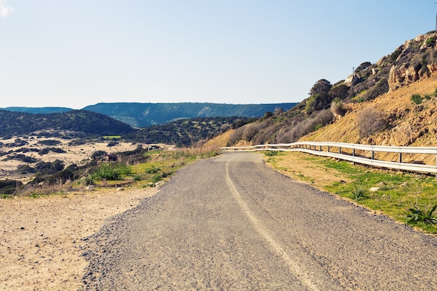 Asphalt road and blue sky in summer day.