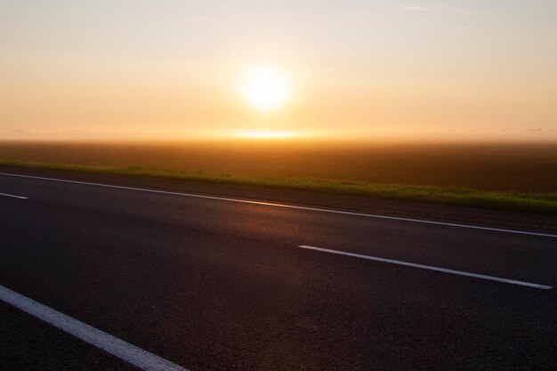 Asphalt road for cars at dawn Morning track without cars