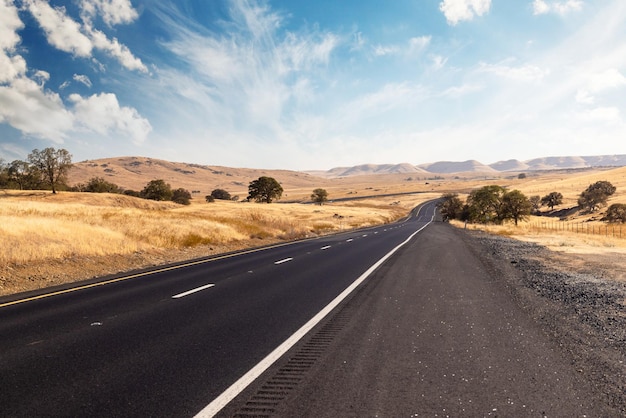 Asphalt road and countryside landscape