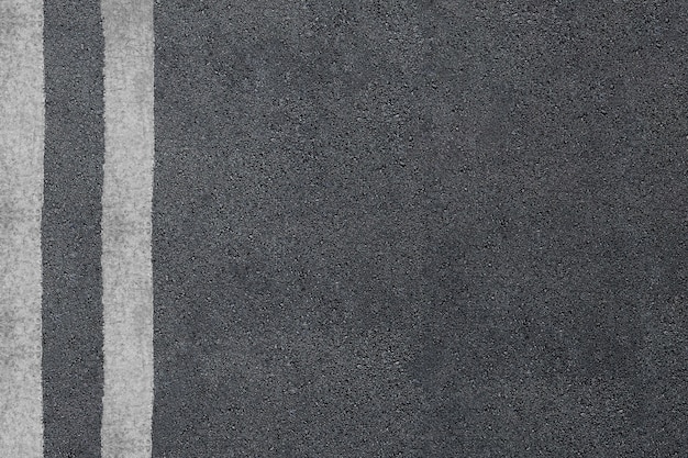 Photo asphalt road with separation lines. highway texture.