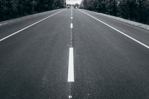 Asphalt road with white markings   background