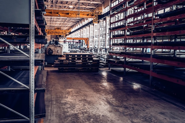 Assembly workshop at big industrial plant tractor assembling