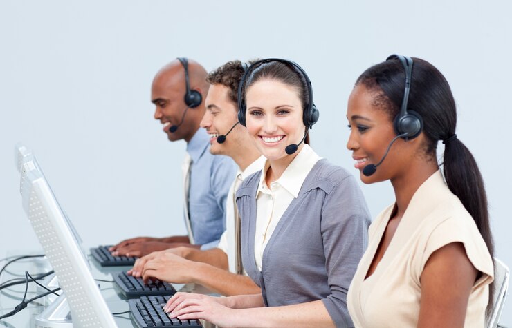 Photo assertive customer service representatives in a call-center