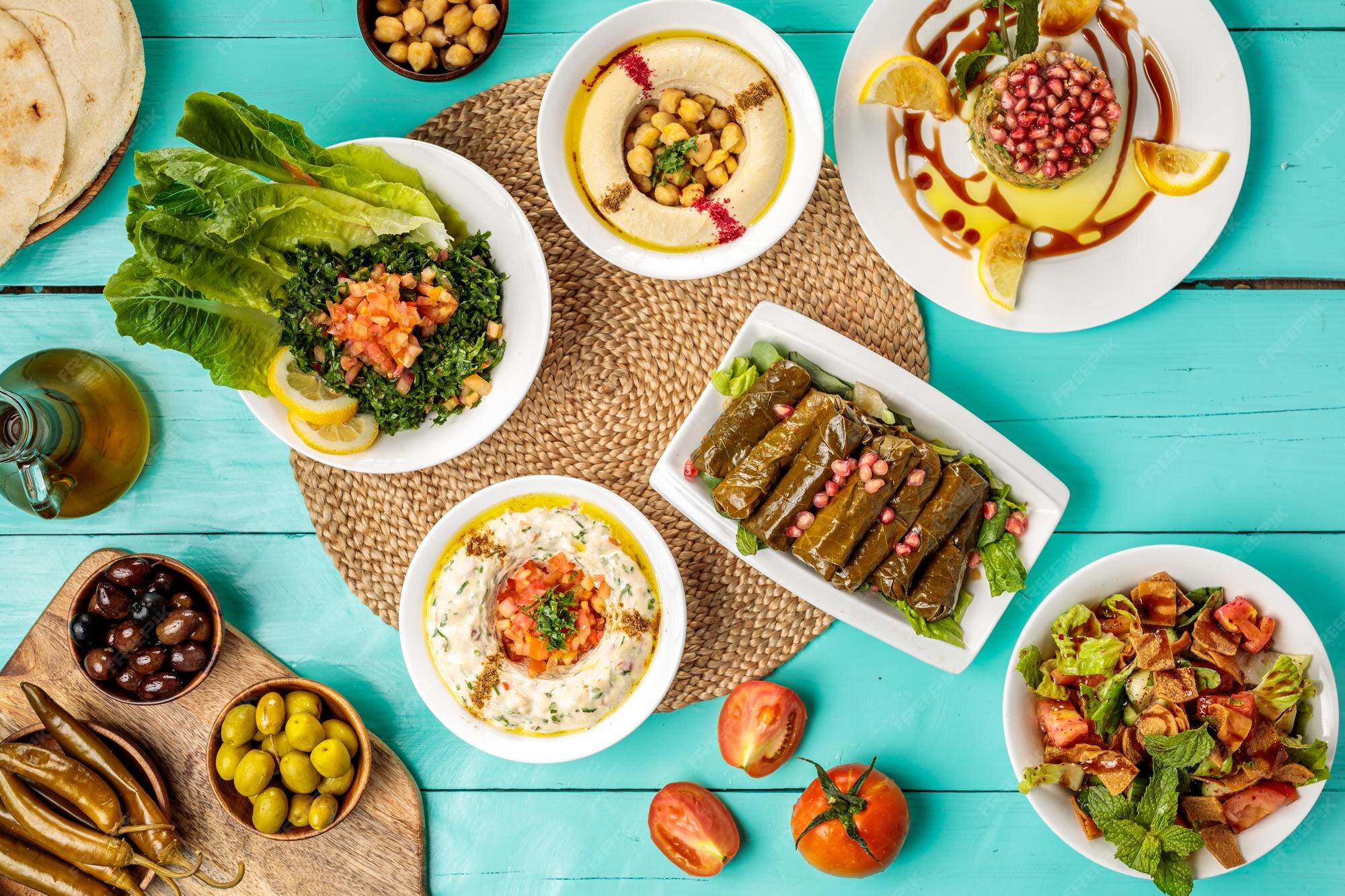 premium-photo-assorted-arabian-food-hommus-beiruti-meat-baba-ghanouj