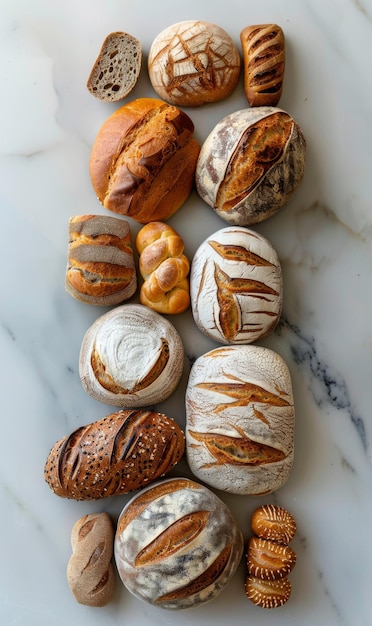 Assorted artisan breads on white marble