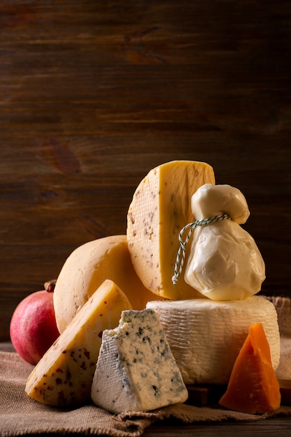 Assorted cheeses and pomegranates