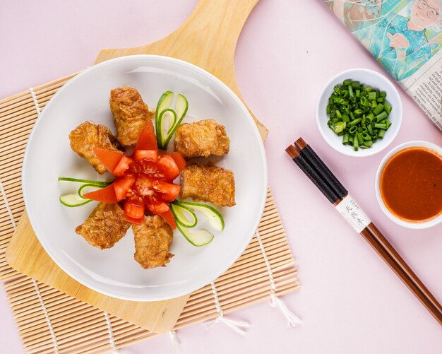 Photo assorted chinese dimsum in bamboo basket