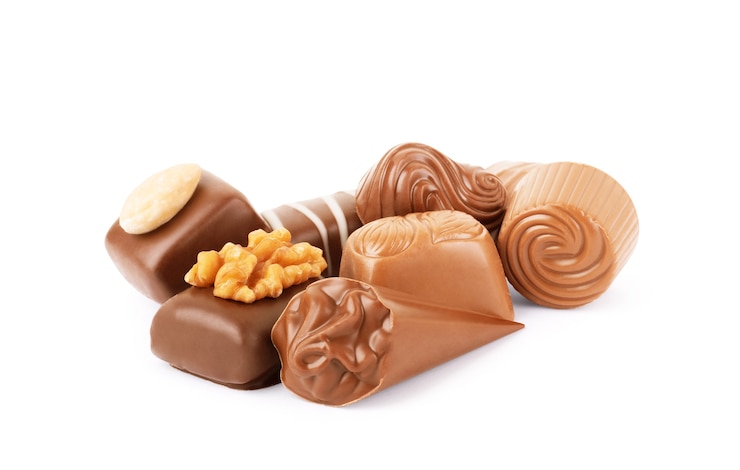 Photo assorted chocolates on a white background