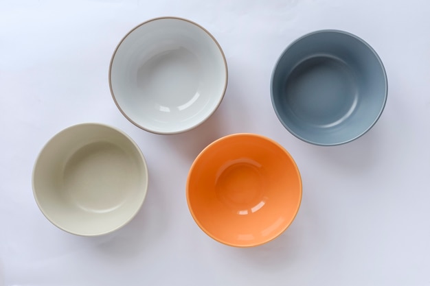 Assorted clean empty bowls and plates for food