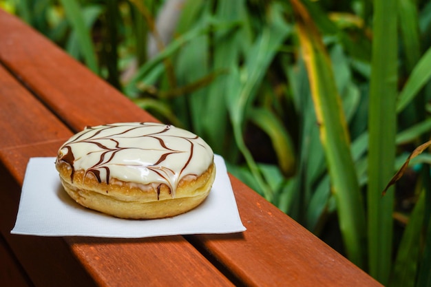 assorted colorful donuts, with assorted toppings of chocolate, nuts, almonds, cheese, strawberries