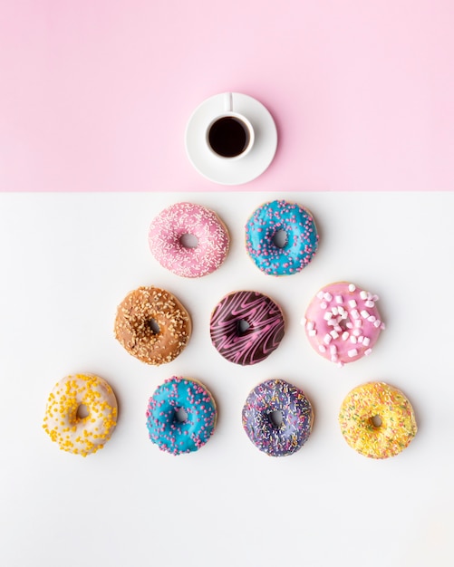 Assorted donuts and coffee top view