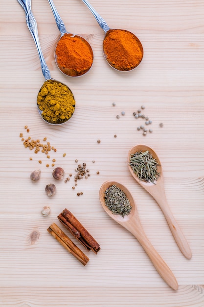 Assorted of dried spices  on wooden background.