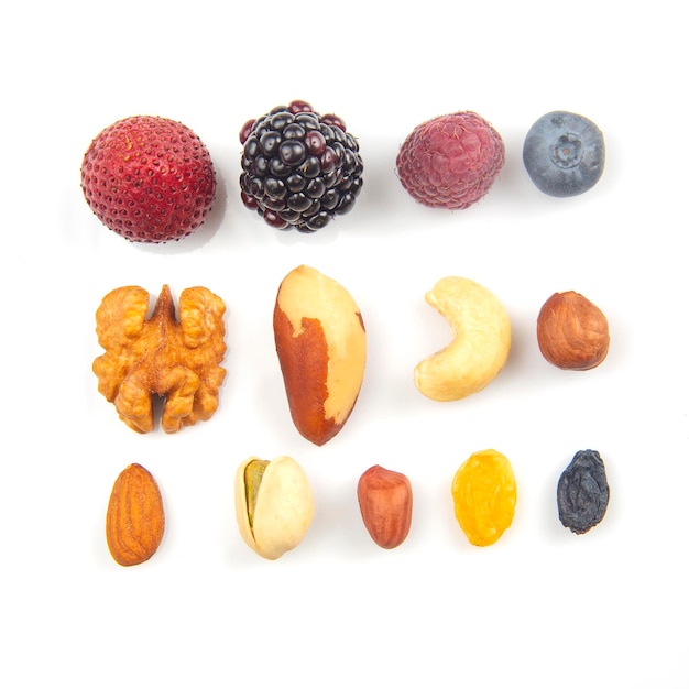 Assorted fresh different berries on a white background. useful vitamin healthy food fruit. healthy vegetable breakfast