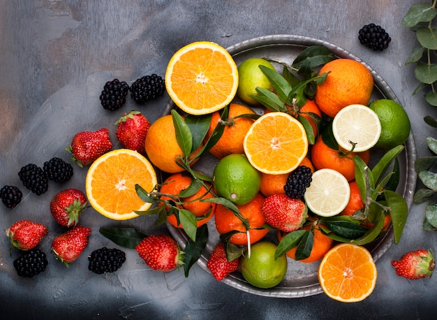 Assorted fruits on a gray background