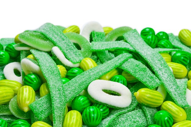 Ассорти из зеленых мармеладных конфет фон Вид сверху желейные конфеты