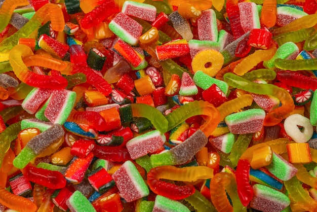 Assorted gummy candies background. Top view.