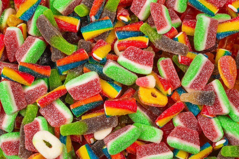 Premium Photo | Assorted gummy candies background
